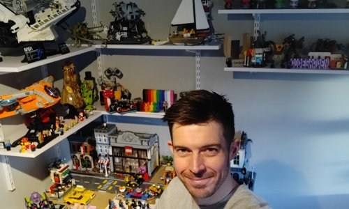 A photo of Owain infront of his lego display